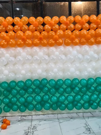 This is a large-scale balloon wall I constructed, forming the Indian tricolor flag. It serves as an impressive backdrop for stage events, photo opportunities, or national day celebrations in corporate spaces.