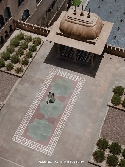Another perspective from the sky, this drone shot showcases the intricate patterns and architecture of the palace courtyard in Jaipur.
