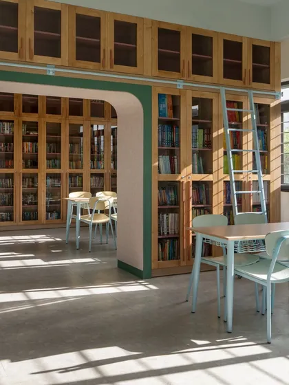 A library is the heart of a school. For the older students, we designed a light-filled, classic library with floor-to-ceiling bookshelves and quiet study areas. The design balances traditional warmth with modern functionality, creating an inviting and inspiring environment for focused learning and discovery.