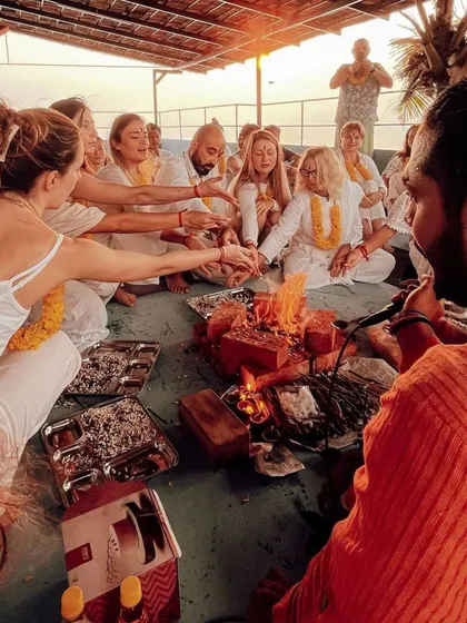 Our training goes beyond physical postures. Here, students participate in a traditional Havan (fire ceremony) during our residential course in Kerala, a practice that deepens the spiritual connection and marks the beginning of their journey.