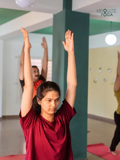 The focus in this student's expression says it all. My classes are designed to help you tune out distractions and tune into your body, fostering a deep sense of presence and awareness.
