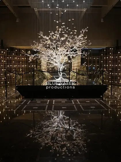 We believe in creating statement pieces that become the centerpiece of a memory. This glowing crystal tree, with its delicate leaves reaching for a rain of light, set a magical tone before the Sangeet even began.