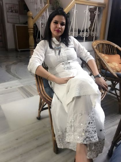 A throwback to this white Chikankari suit with mirror work palazzo pants. It's a beautiful combination of two traditional crafts, perfect for a festive look.