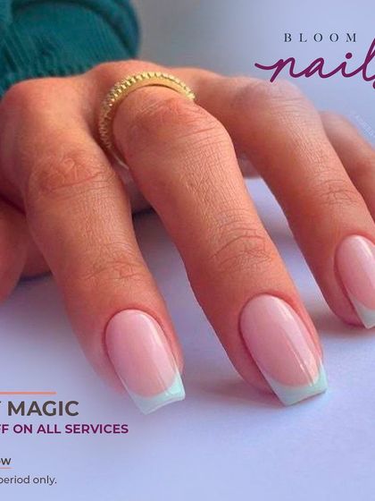 A softer take on the French manicure with a mint green tip on square-shaped nails. It's a fresh and subtle pop of color.