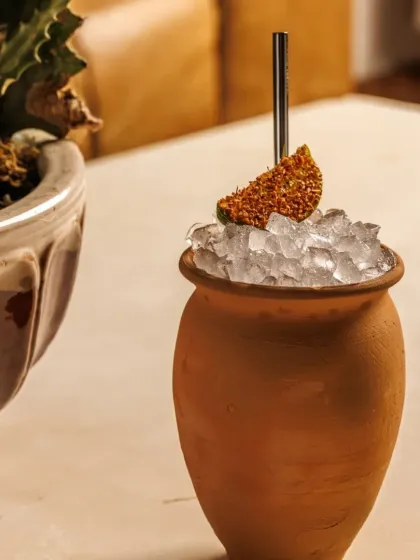 Bringing earthy, local flavors to our cocktails. This refreshing drink is served in a traditional mitti ka bartan, or terracotta pot, for a rustic touch.
