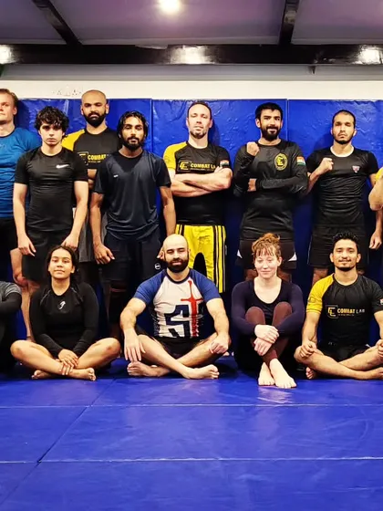 Come train with us. This is our crew after a Jiu-Jitsu class. A diverse group of people all working towards the same goal of self-improvement.