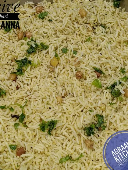 This is traditional Sasive Kobbari Chitranna, a flavorful rice dish made with mustard seeds and fresh coconut. It's a classic Brahmin-style recipe that is both simple and delicious.