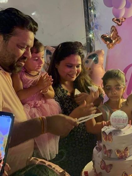 Another happy moment from the butterfly-themed birthday party.