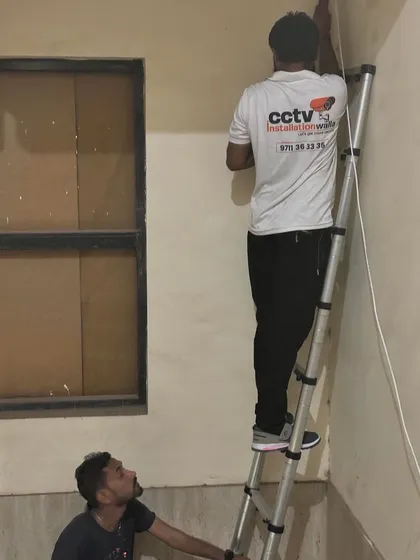 My team working together on a wiring job. We believe in teamwork to get the job done right and efficiently.