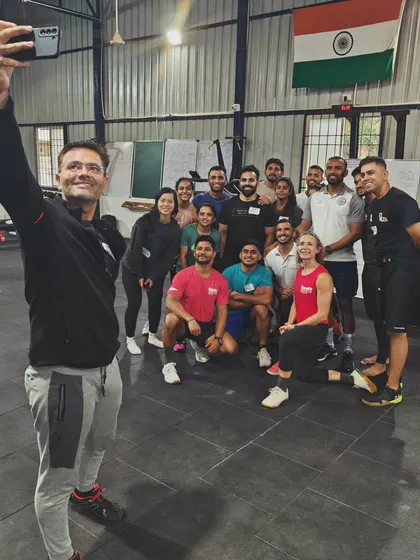 A group selfie with all the participants and instructors from a CrossFit certification weekend. It's all about learning and having fun.