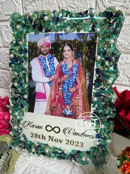 The frame is shown on its stand, demonstrating how it serves as a beautiful piece of home decor.