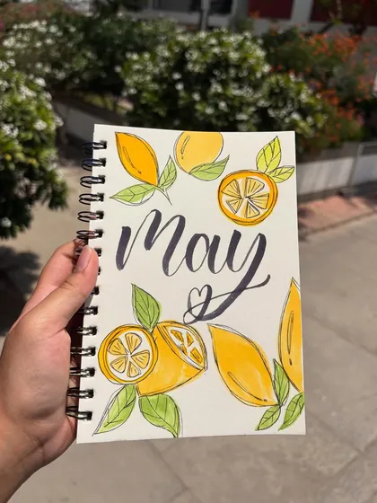 My journal entry for the month of May, decorated with lemon doodles and calligraphy.