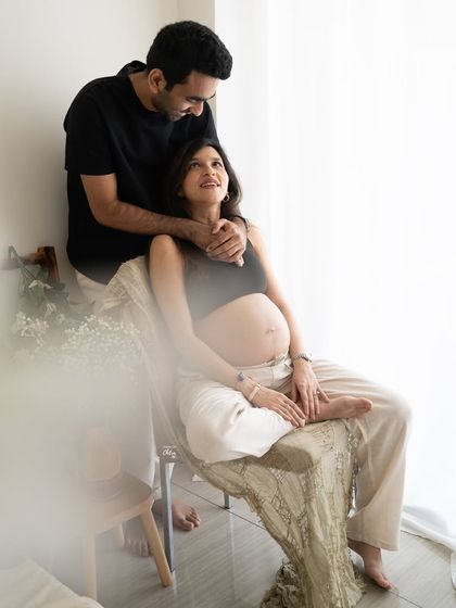 The look of love. This light-filled image captures a beautiful, unposed moment of connection between the expecting couple.
