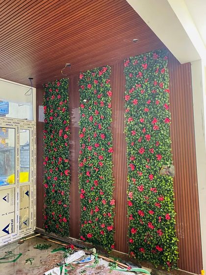 For this interior project, the client wanted a splash of color. We used panels with vibrant red flowers set against dark wood-paneled walls for a bold and elegant look.