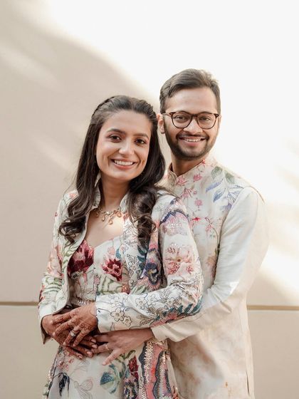 Two hearts, one beautiful story. This couple is glowing with love at their Mehendi ceremony, and her makeup is fresh, floral, and fun.
