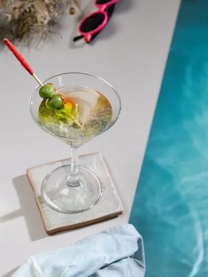 For those who like their decor "shaken, not stirred," here is my martini gel candle. It looks just like the real thing, complete with olives, and is a super fun addition to a party or a unique gift for a cocktail lover.