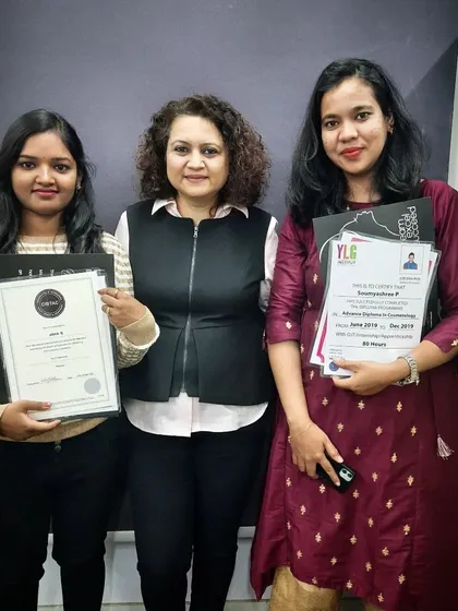 Graduation day is a proud moment for both our students and instructors. Here, graduates hold their YLG Institut and CIBTAC certificates, ready for the next step.