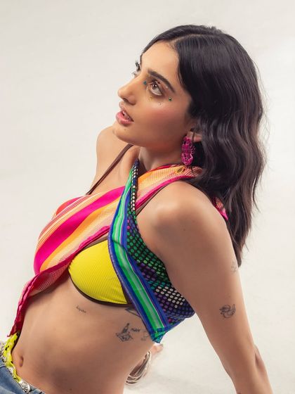 A more thoughtful moment from the same shoot. My style is a mix of colorful, fun, and edgy elements.