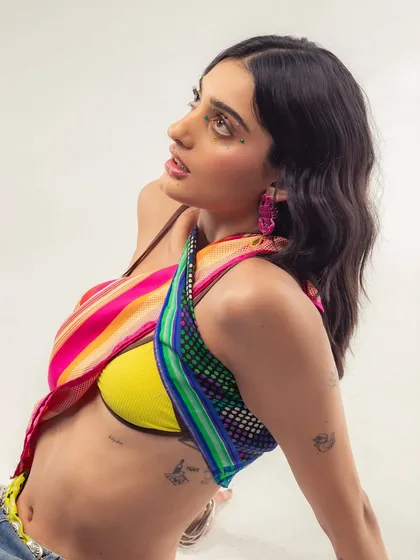 A more thoughtful moment from the same shoot. My style is a mix of colorful, fun, and edgy elements.