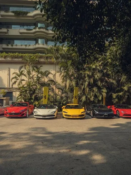 A wide shot showcasing the impressive scale of the Ferrari Weekender car meet. I am experienced in handling the audio needs for both intimate and large-scale brand events.