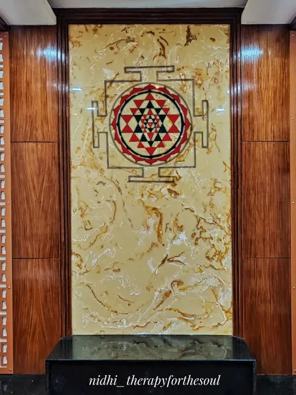 Creating art for sacred spaces is a privilege. This Sri Chakra was hand-painted directly onto a backlit marble-finish panel in a pooja room, demonstrating how I can work on various surfaces to bring spiritual energy and beauty to your home.