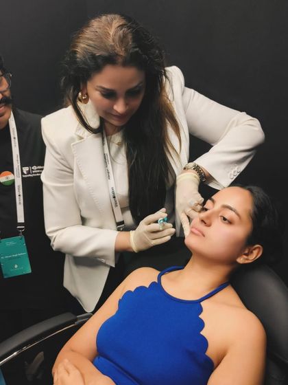 Another view of a live demonstration of an injectable treatment. These procedures, like the Skinvive treatment by Juvederm, are designed to improve skin quality and hydration from within, which can be beneficial for overall skin health and texture.