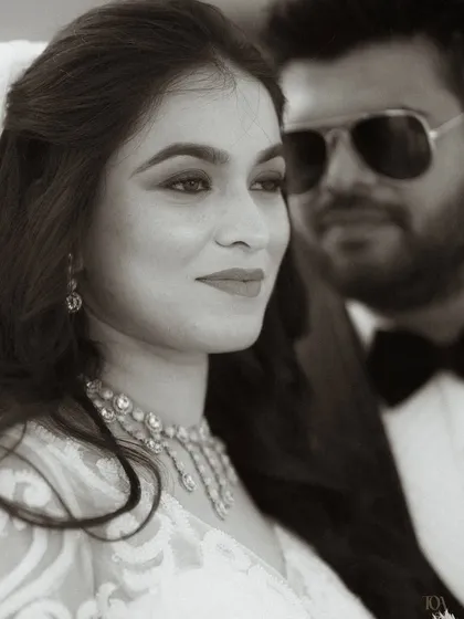 A classic black and white portrait of the couple.