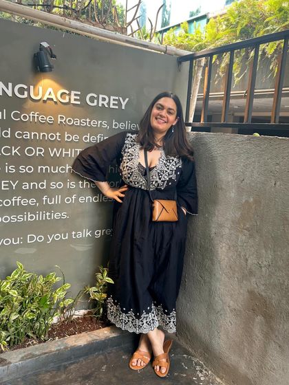 Breakfast in a bustling city is one of my passions. This photo from a cafe in Mumbai captures a moment of quiet enjoyment amidst the city's energy.