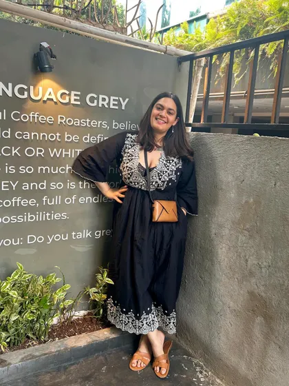 Breakfast in a bustling city is one of my passions. This photo from a cafe in Mumbai captures a moment of quiet enjoyment amidst the city's energy.