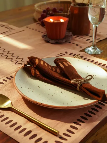 A collection of our product photography for various home decor and tableware brands. These shots display a range of items including placemats, table runners, ceramic bowls, plates, vases, bar tools, and candles, all styled to perfection.