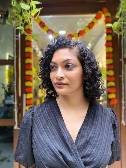 More examples of my short curly haircuts, from bobs to layered chops, each one personalized to the client's curl pattern and face shape.