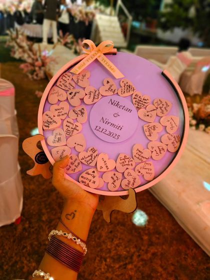 Holding up the finished wish board at the engagement party. It’s so rewarding to see my creations become a part of such happy celebrations.