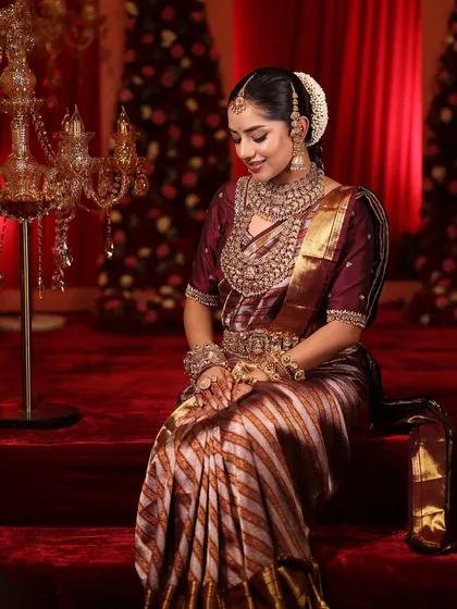 A demure, classic bridal pose. The makeup is designed to look beautiful from every angle.