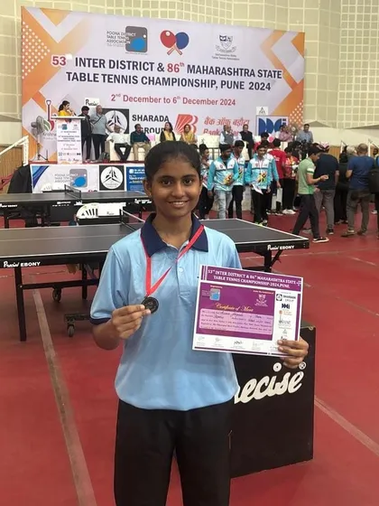 Swara Jangade with her bronze medal from the U-17 girls' event at the Maharashtra State Championship in Pune, showcasing her strong performance.