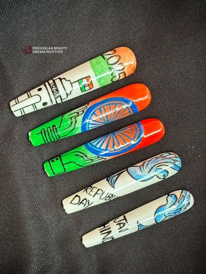 A different arrangement of the patriotic nail art, showcasing the versatility and creativity of our students.