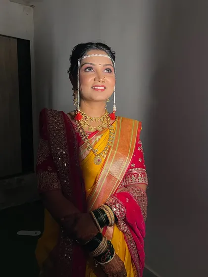 A beautiful portrait of my bride, looking radiant and serene. The lighting highlights the soft glow of her skin and the intricate details of her bridal attire.