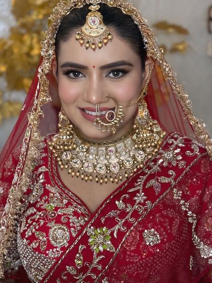 A bright and happy bridal portrait. The makeup is designed to look perfect in photos, with a camera-ready, long-lasting finish.