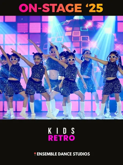 Another fantastic shot of our Kids Retro performance. The group's synchronized pointing pose demonstrates the discipline and focus they learn in our classes.