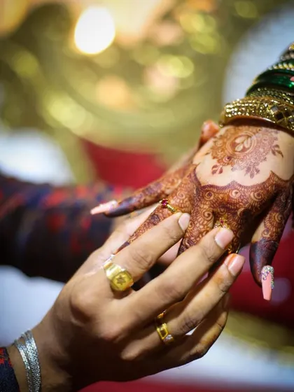 There's nothing better than seeing my mehendi as part of your celebration. This candid moment captures how henna art adds a beautiful, traditional touch to any event.