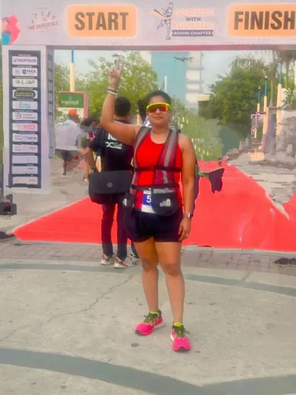 A member at the finish line of the Rohini chapter race. We celebrate every finisher.