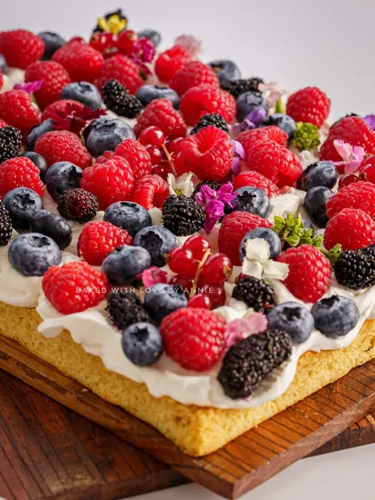 Experience the ultimate dessert with my moist, egg-free Vanilla Sheet Cake with White Chocolate Mousse and Fresh Berries. It’s a light yet indulgent treat, crowned with an array of the finest berries.