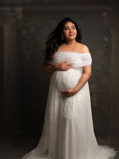 Looking towards the future. This pose captures the hope and wonder of what’s to come, with soft light and a gentle expression.