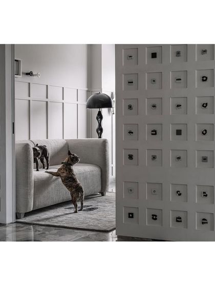 Our furry clients, Luna and Lylo, enjoying their home. We believe in creating spaces that are beautiful for people and comfortable for their pets, and this image captures that philosophy perfectly.