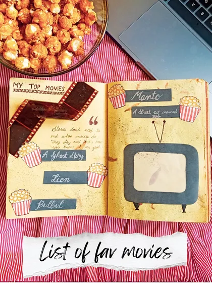 Art journal idea: make a list of your favorite movies. Use creative elements like film strips and popcorn buckets to bring the theme to life.