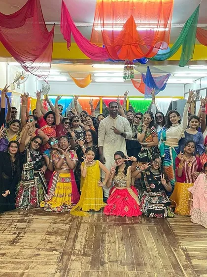 Another fantastic group shot from our Dandiya night. The studio was filled with color, music, and incredible energy.
