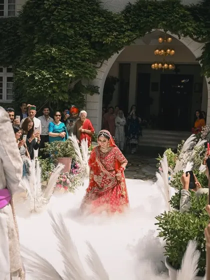 Every bride deserves a grand entrance. At this Shimla wedding at the Woodville Palace, we used smoke to create a dramatic, dreamlike path for her. It’s about creating that movie-like moment you've always imagined.