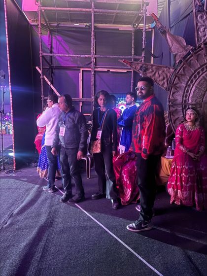 Our stage manager overseeing artist movements in the wings during the Khelo India ceremony. We ensure performers are in position and ready for their entrance.