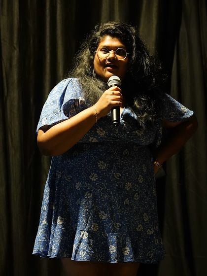 A stand up comedian shares a story and a laugh with the audience. Our open mic nights are a fantastic platform for budding comedians to test their material in a supportive environment.