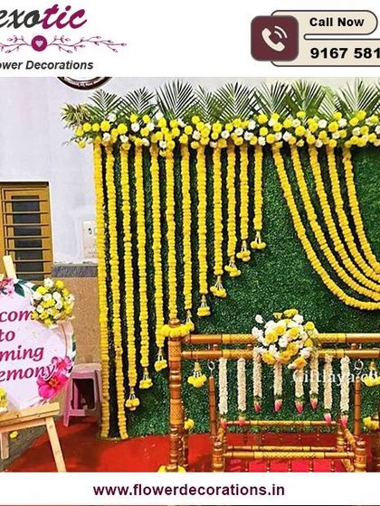 A beautiful setup for a baby's naming ceremony. We created a backdrop of marigold garlands against a green wall, with a traditionally decorated cradle, or 'palna', ready for the baby.