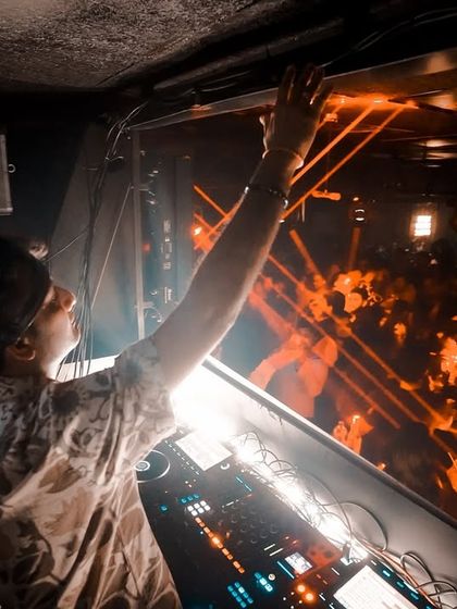 A view from above the crowd in Hyderabad, reaching out as the lasers cut through the dark.